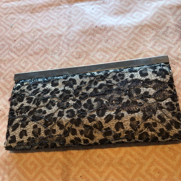 Animal print wallet, snap closure, new or like new. Animal prints are back in! - Picture 2 of 4